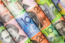 Австралийский доллар упал до 0,7157 по отношению к доллару США