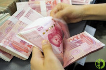 Народный банк Китая установил центральный паритетный курс национальной валюты (юаня) на уровне 7,0298 за доллар США