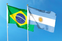 Чрезмерная инфляция может привести национальные валюты Бразилии и Аргентины к существенной девальвации