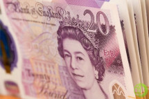 Британский фунт в четверг вырос до 1,2575 доллара на фоне низкого объема торгов ввиду празднования Дня благодарения в США