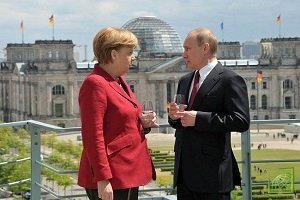 Лидеры России и Германии провели переговоры в Бразилии, куда прилетели на финал ЧМ-2014.
