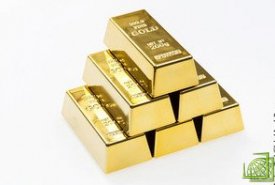 Цена на золото снизились на 0,16% до $1.578,97 за тройскую унцию к 14:07 МСК
