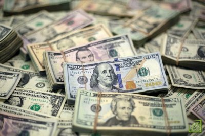 Минимальный курс доллара США составил 63,6475 руб., максимальный - 63,875 руб