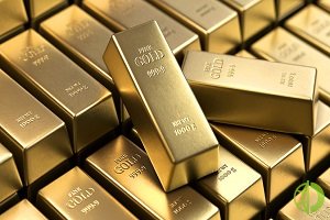 В среду на рынке золота отмечается коррекция на фоне опасений инвесторов за перспективы мировой экономики