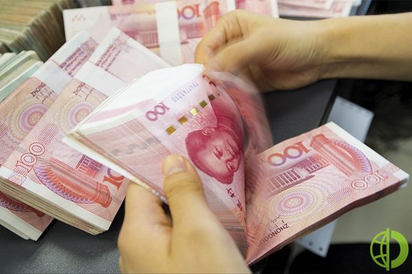 Народный банк Китая установил центральный паритетный курс национальной валюты (юаня) на уровне 7,0298 за доллар США